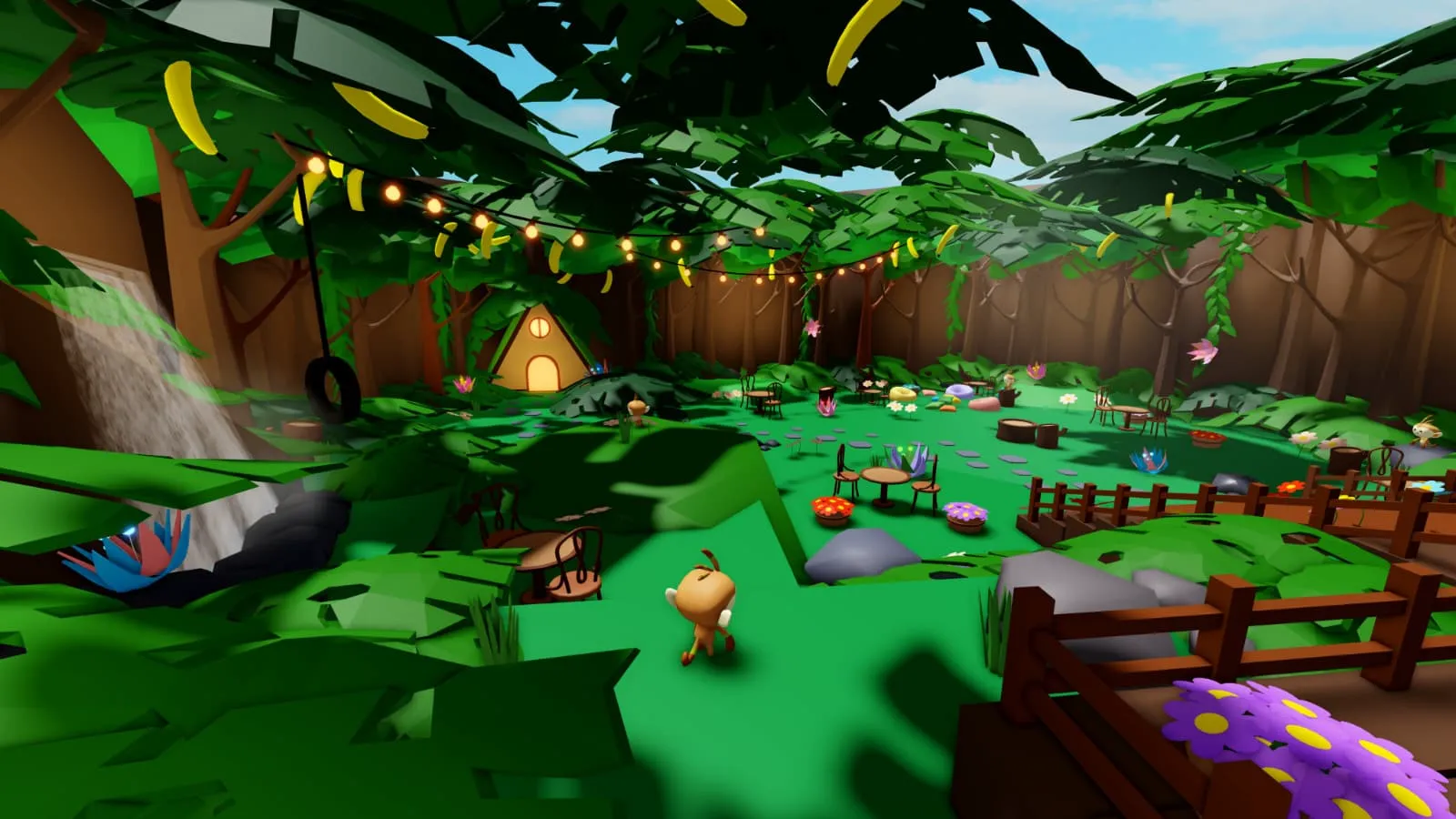 Jungle hangout area with string lights, tables and a tree house